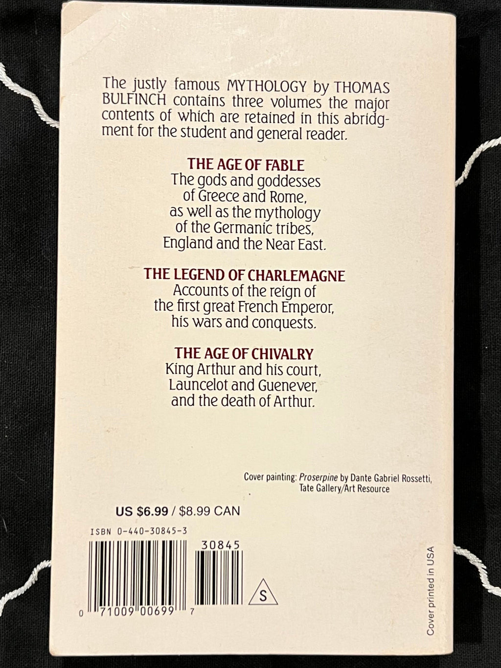 The back cover of a book titled 'Mythology' by Thomas Bulfinch, displayed flat on a black background with white line art illustrations.