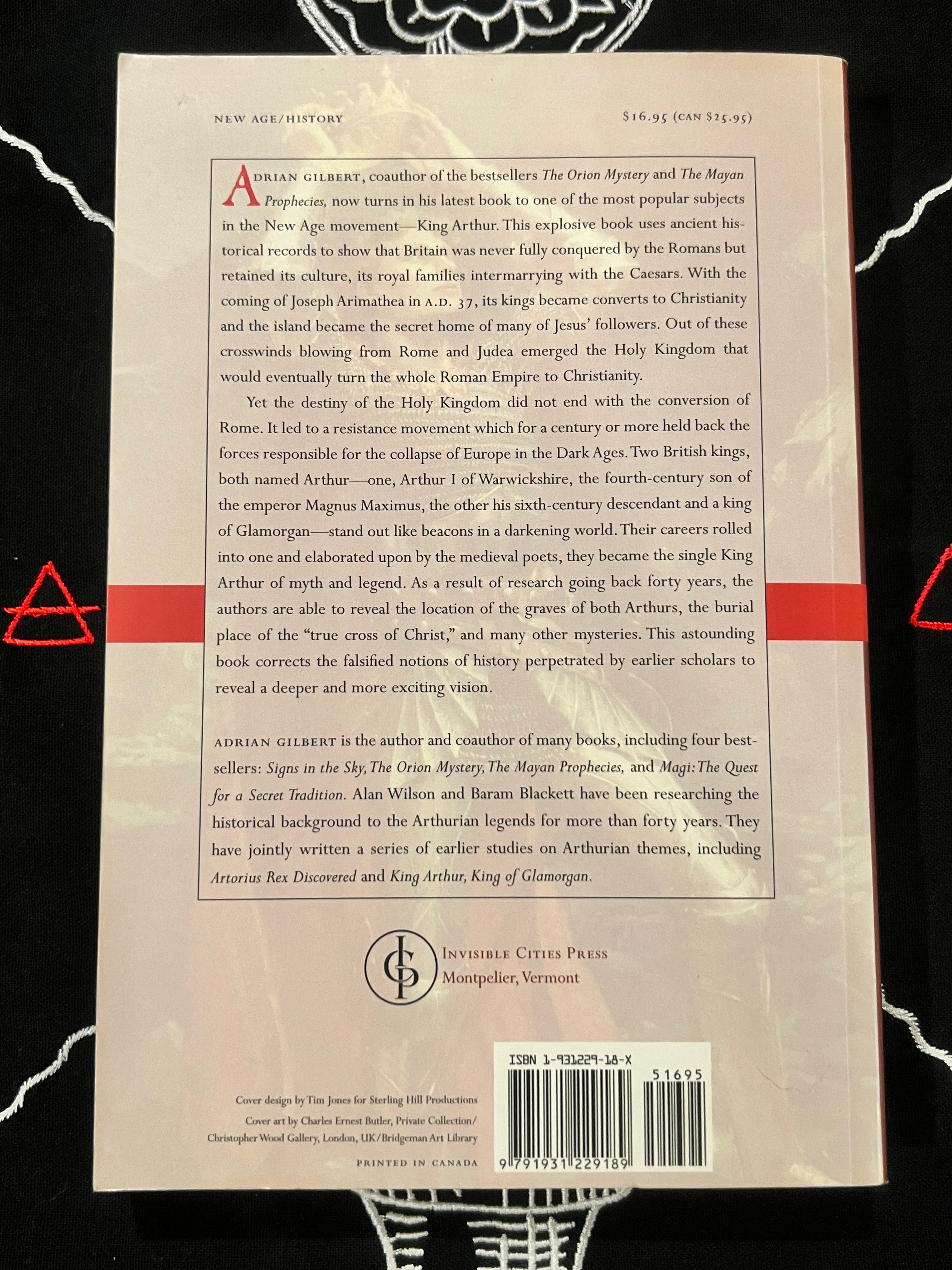 The back cover of a book titled 'The Age of Kings' by Adrian Gilbert, published by Interscope Books Press. The cover is cream-colored with black text, featuring a central title block, an abstract preview, a barcode, and a black-and-white photographic strip along the bottom edge.
