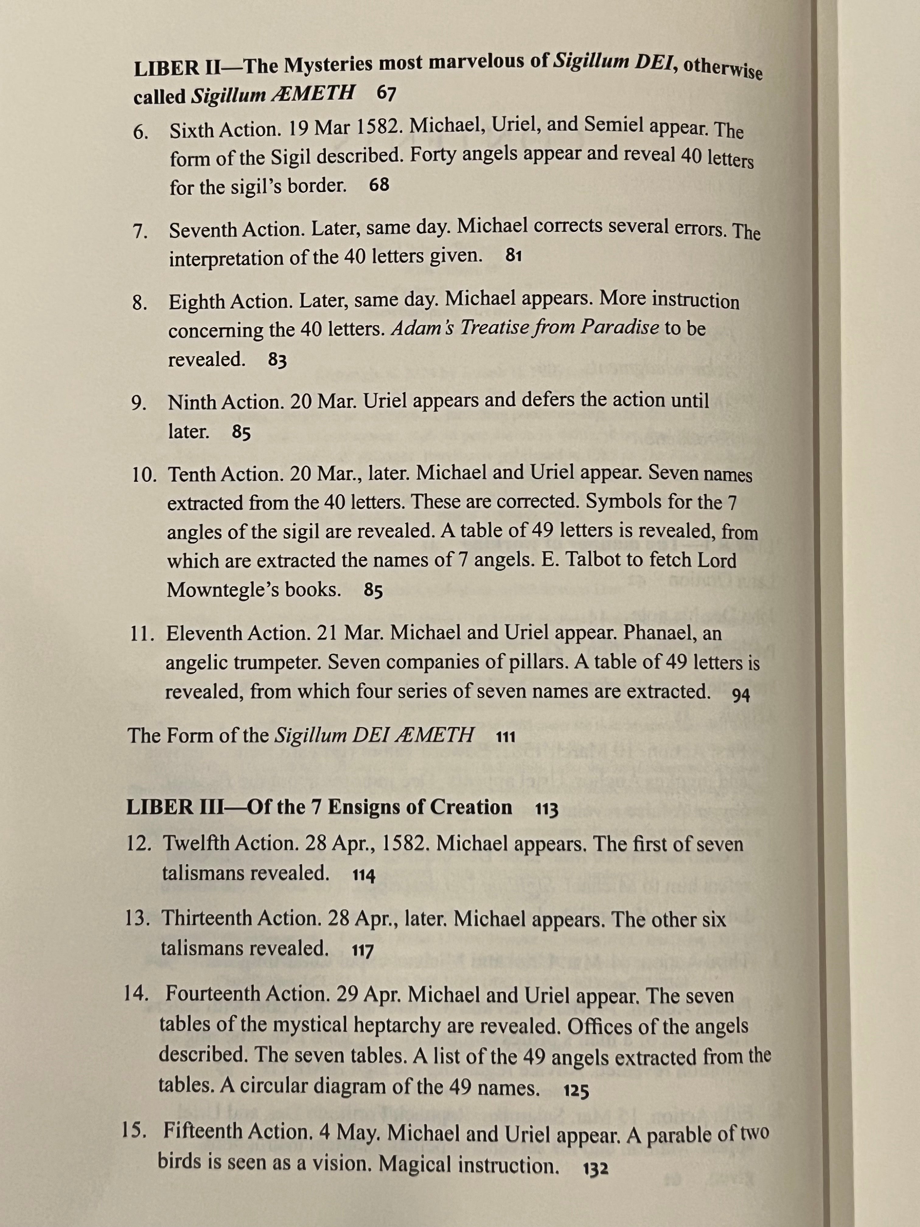 A printed page from a book or booklet showing two columns of text with numbered paragraphs and footnotes, photographed against an off-white background.