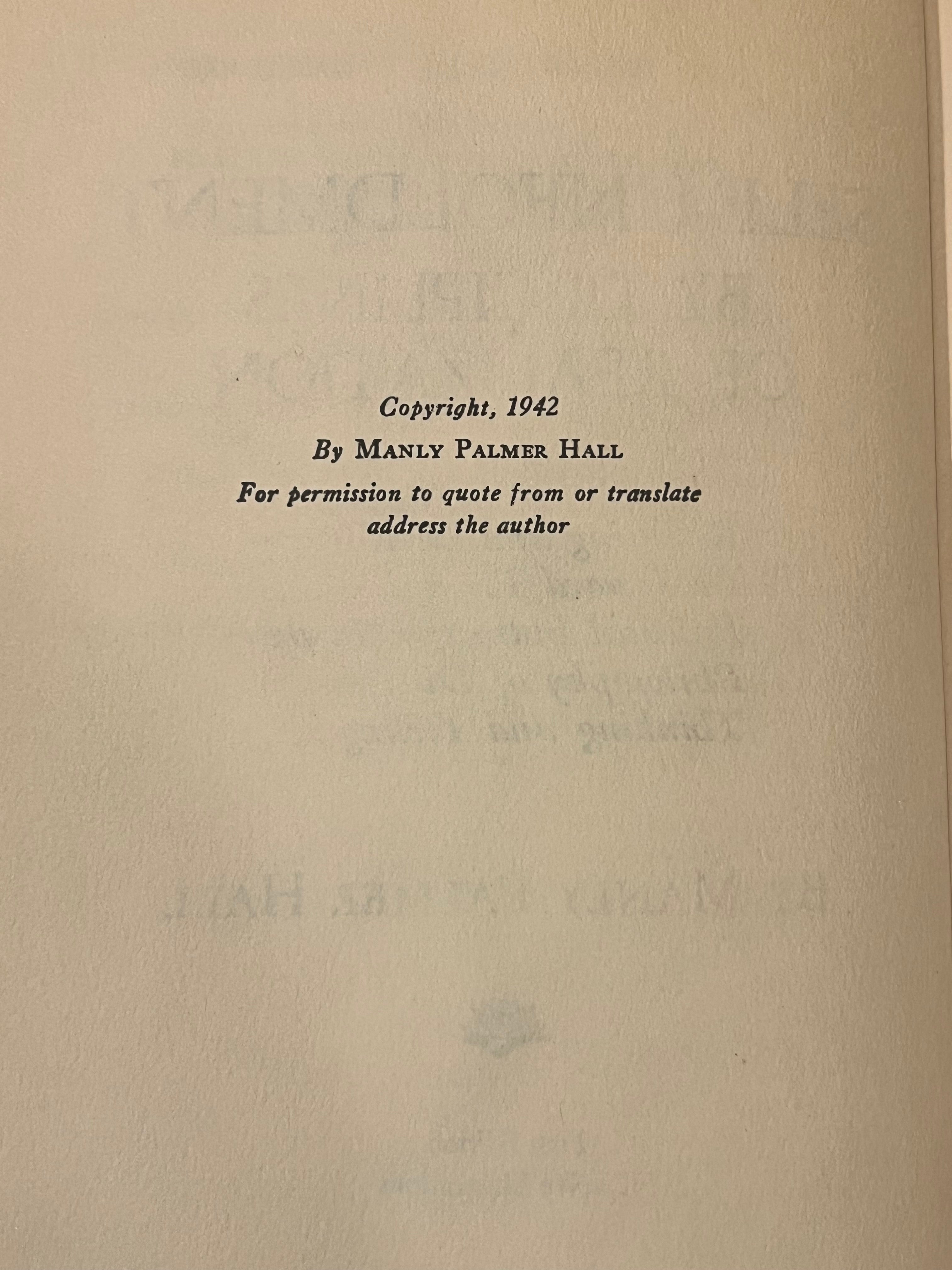 A close-up of an aged beige paper page with black printed text reading 'Copyright, 1942 By Manly Palmer Hall For permission to quote from or translate address the author'.