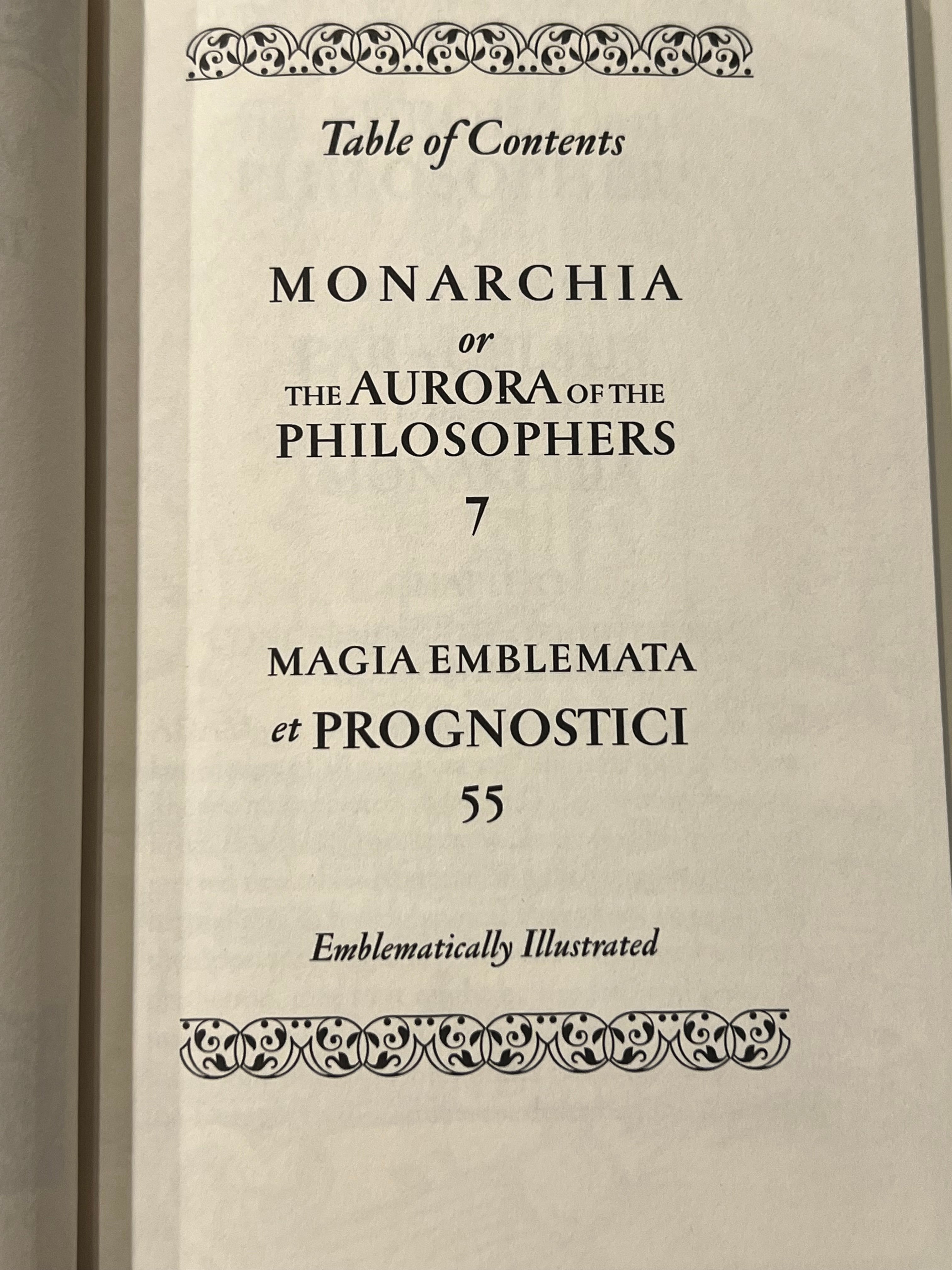 A close-up of a printed book page showing the table of contents for 'Monarchia or the Aurora of the Philosophers', with decorative ornamental borders at the top and bottom.