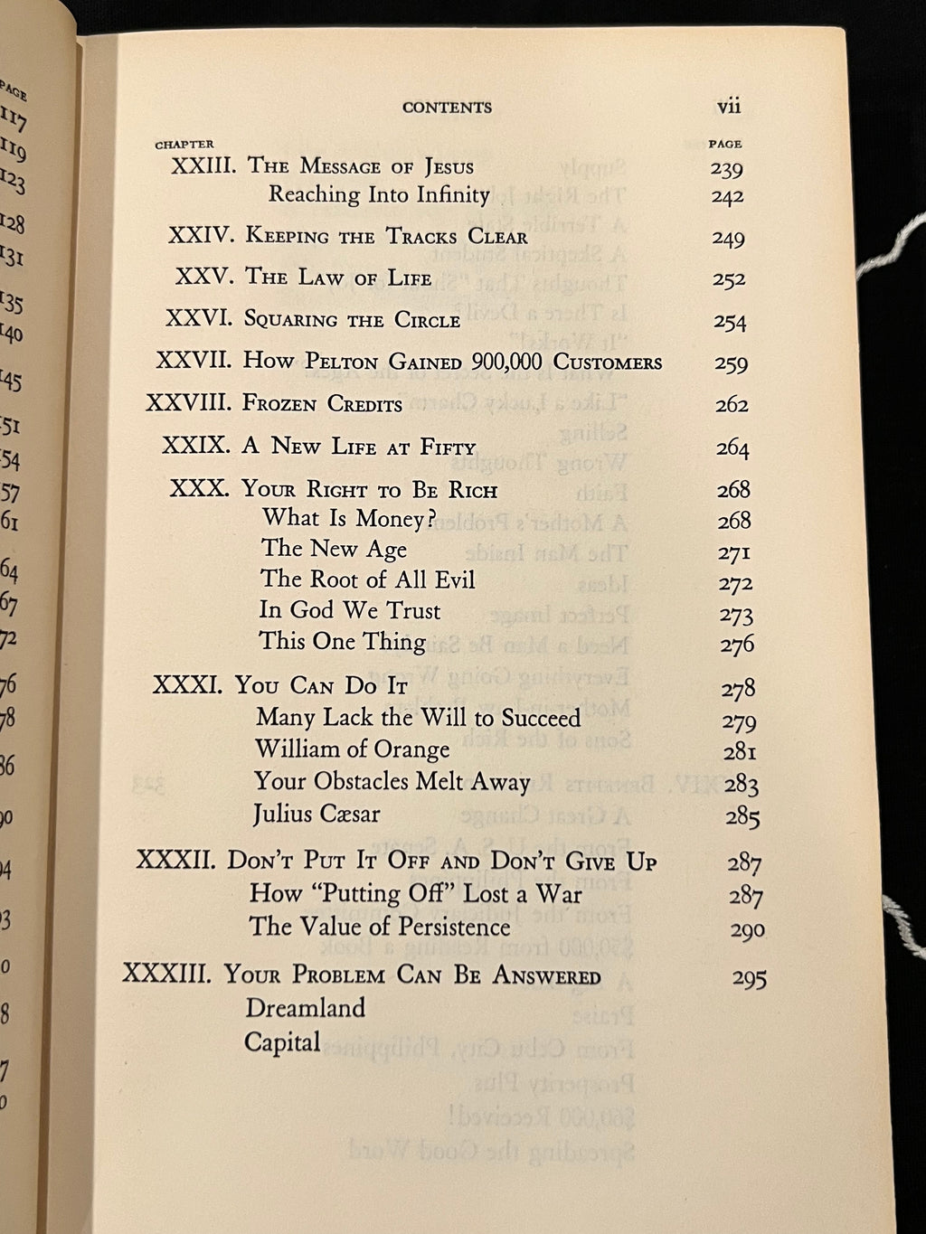 A printed book page showing the contents table from 'The Power of Love' by Julius Ceasar, with black text on aged cream paper.